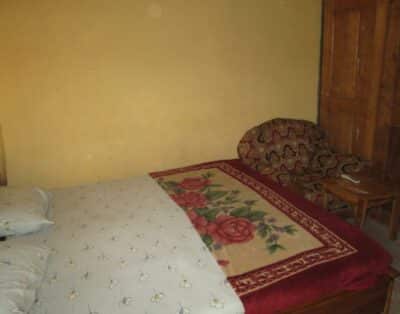 Semi Standard Double Bed Tv And Fan Room In Pocer Guest Inn In Otukpo, Benue