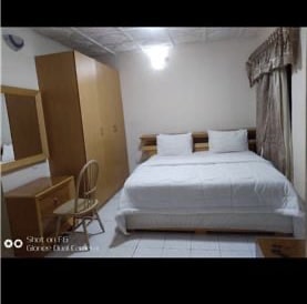 Deluxe Room in Princegate suites and Hotel.